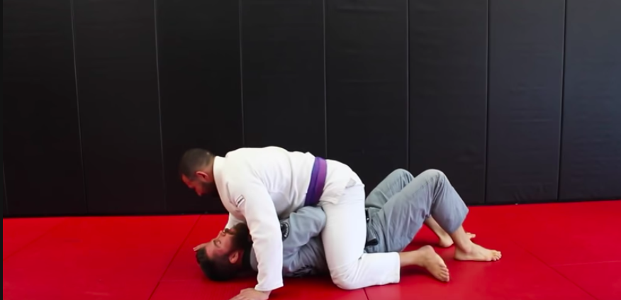 Escape a Heavy Mount in BJJ with a Sweep ( Single X Sweep )